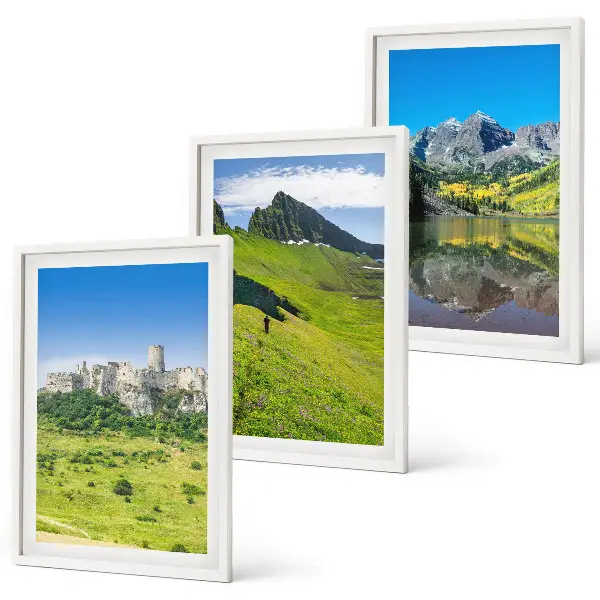 Grüne Hügel mit einer Burg Bilder-3er-Set mit Rahmen