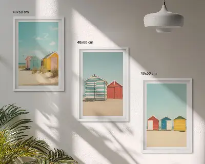Gerahmtes Bilderset mit bunten Häusern am Strand bei Sonne
