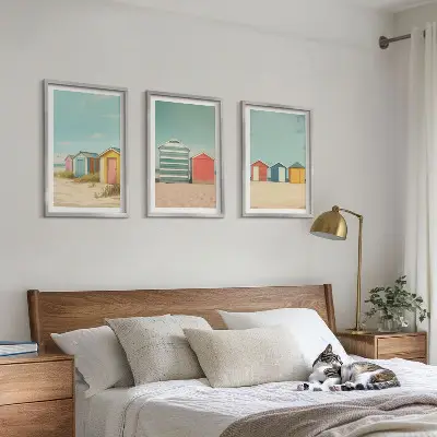Bilder-3er-Set mit Rahmen bunte Häuser mit Strand und Sonne