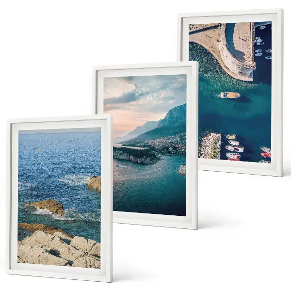 Bilder-3er-Set mit Rahmen mit Motiven von Meerblick, Klippen und Häfen