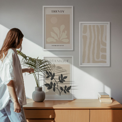 Gerahmtes bilderset Stilvolle Pflanzenmuster in Beige und Schwarz