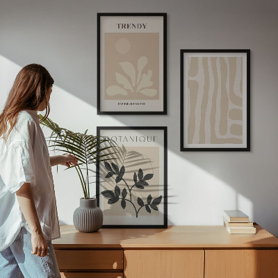 Gerahmtes bilderset Stilvolle Pflanzenmuster in Beige und Schwarz