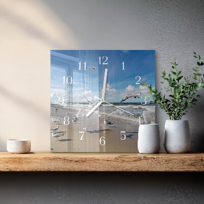 Quadratische wanduhr Möwen am Strand