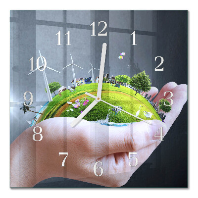 Quadratische wanduhr Erde in der Hand