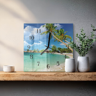 Quadratische wanduhr Palmen am Strand