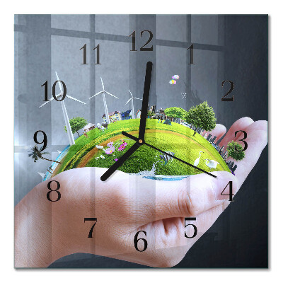 Quadratische wanduhr Erde in der Hand