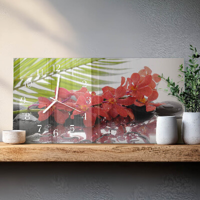 Horizontale glas wanduhr Blumensträuße und Steine
